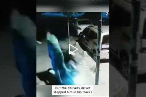 Delivery Man Drop-Kicks Suspect Who Tried to Take Motorbike #shorts