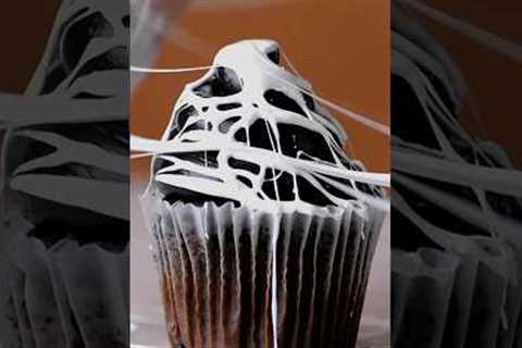 Make your cupcakes spooky with this marshmallow cobweb hack #short